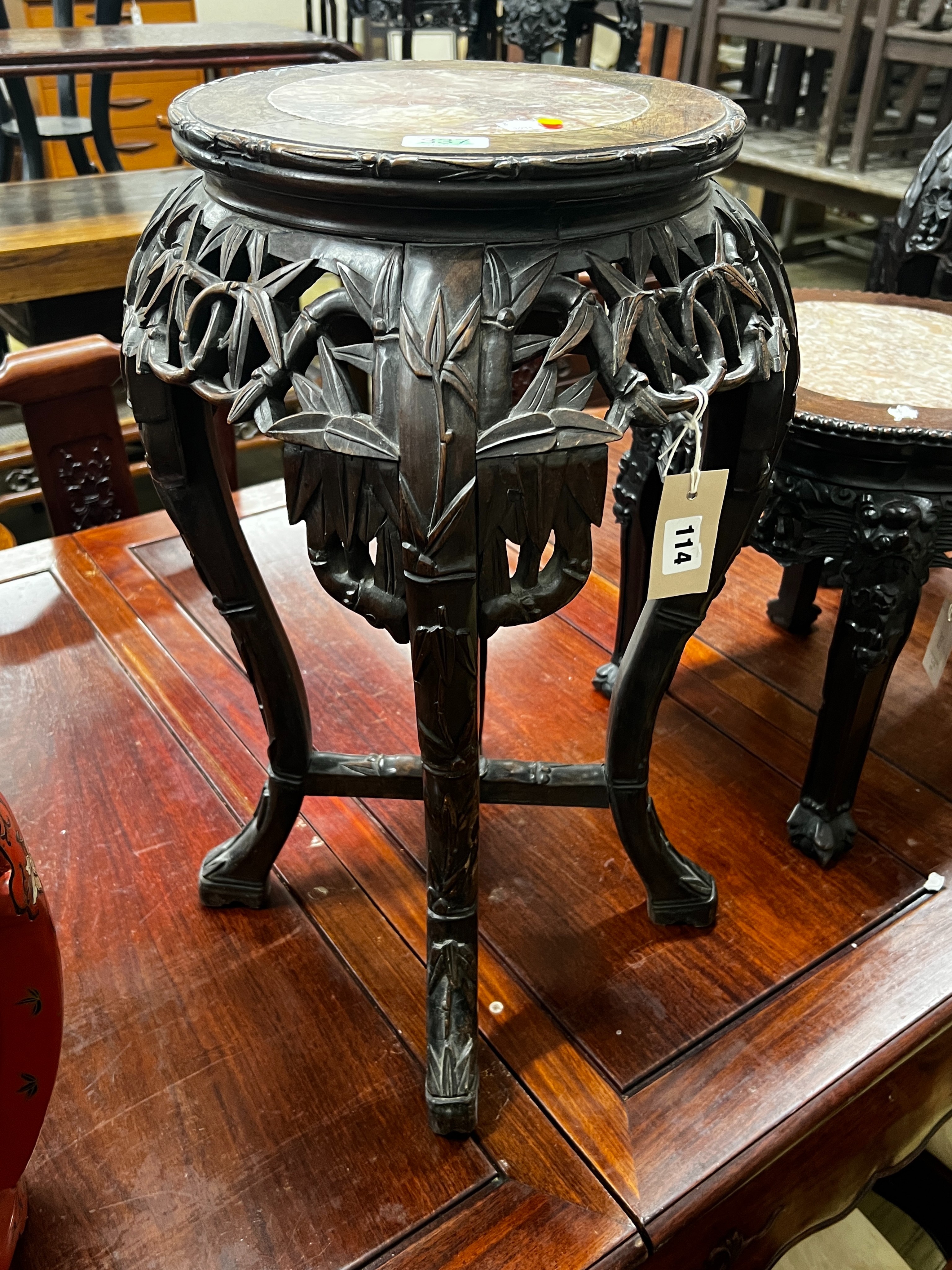 A Chinese circular marble top hongmu vase stand, width 39cm, height 62cm